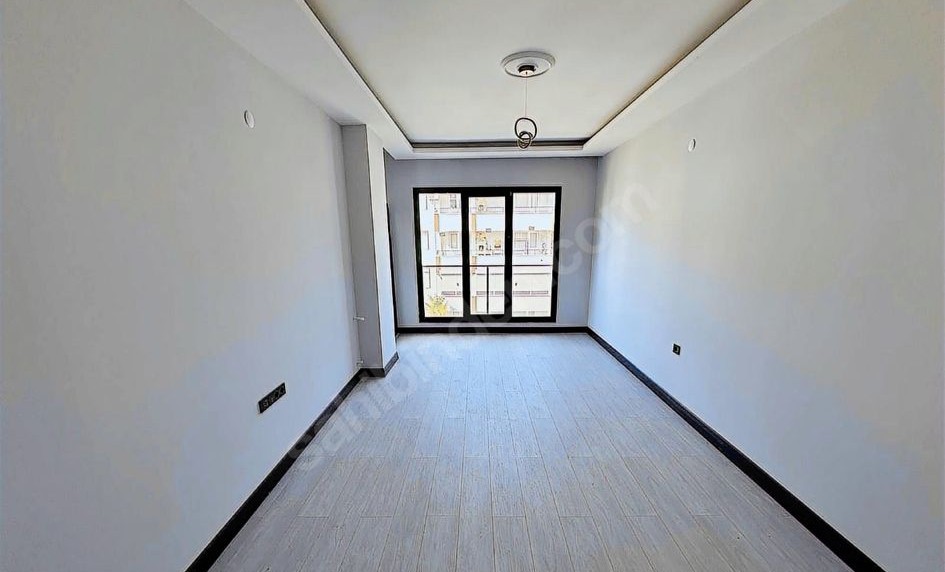 ALTINKUM’DA SATILIK 2+1 AYDINLIK DAİRE DENİZE YÜRÜME MESAFESİNDE