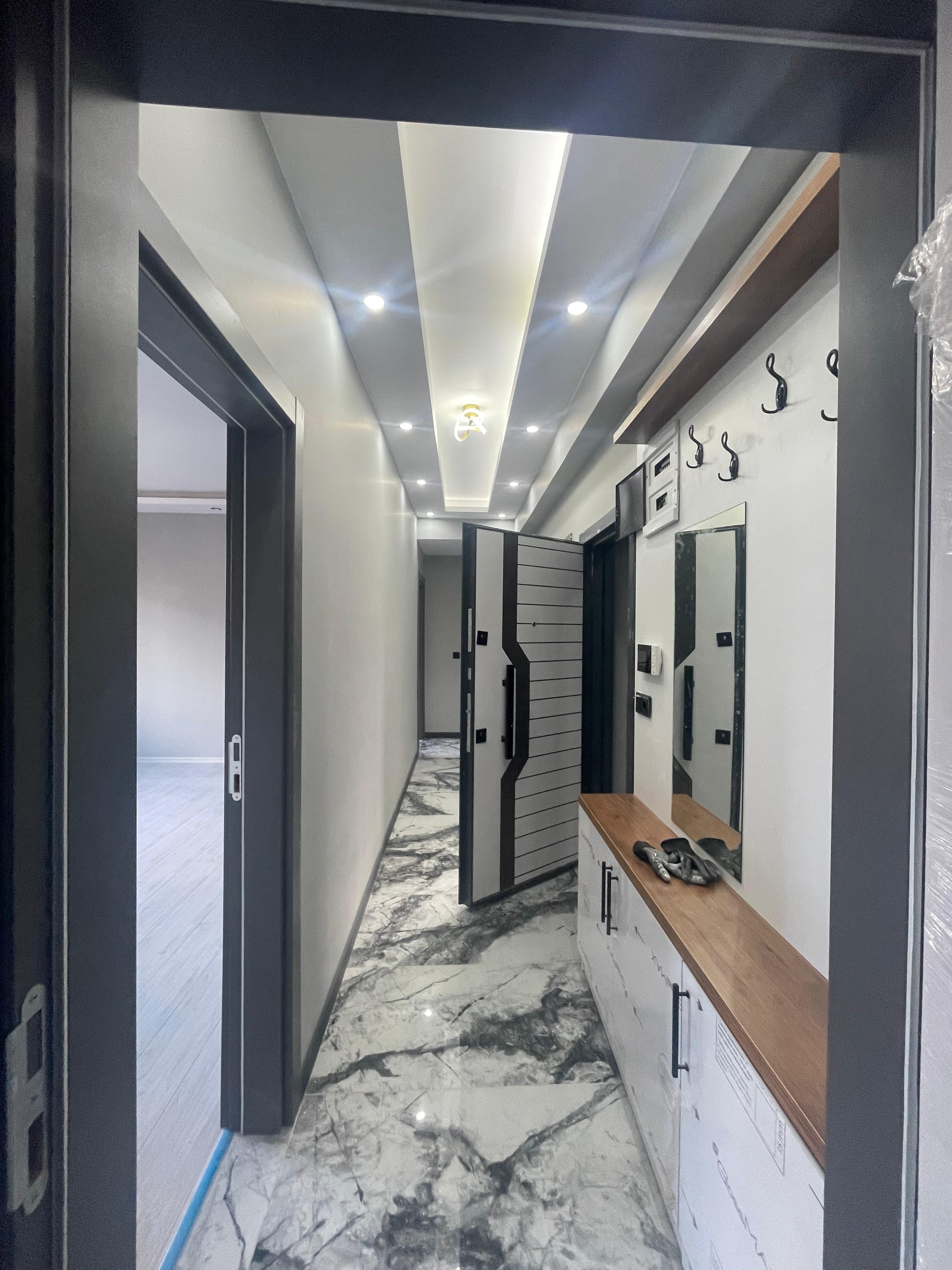 TUZCUMURAT MAHALLESİNDE SATILIK 2+1 DOĞALGAZLI ARAKAT DAİRE