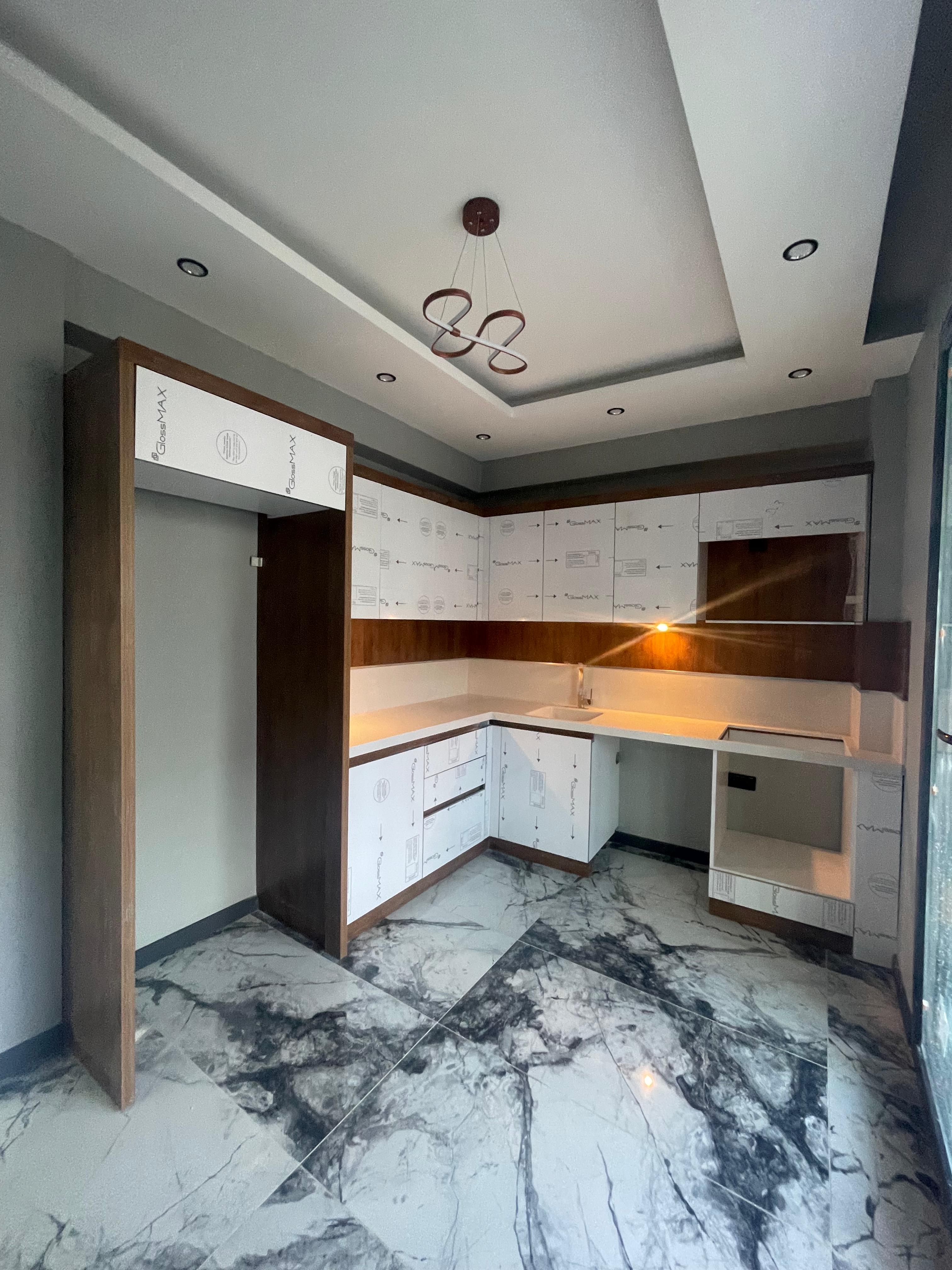 TUZCUMURAT MAHALLESİNDE SATILIK 2+1 DOĞALGAZLI ARAKAT DAİRE