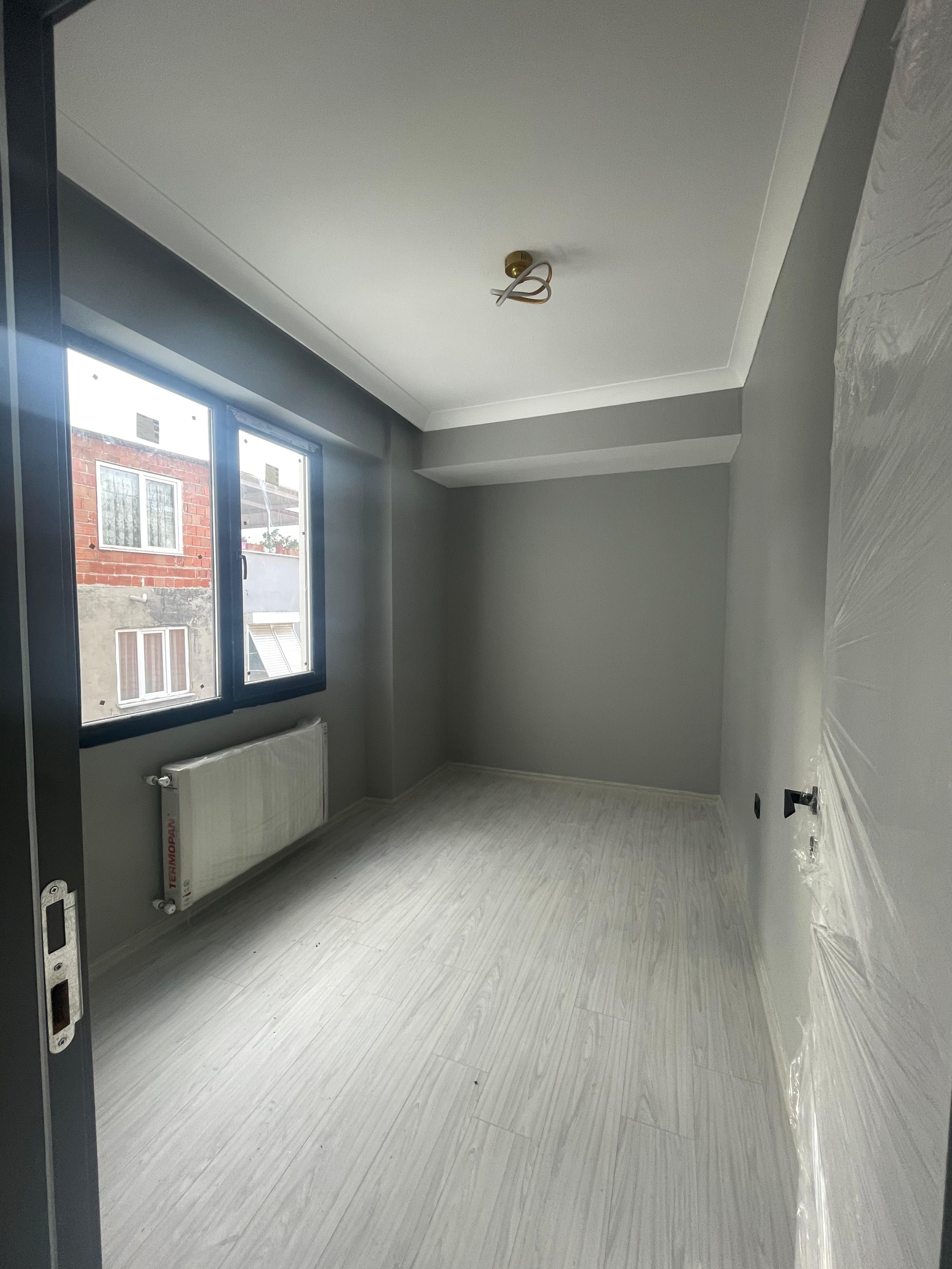 TUZCUMURAT MAHALLESİNDE SATILIK 2+1 DOĞALGAZLI ARAKAT DAİRE