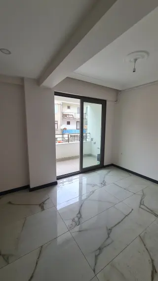 Burhaniye Kocacami Mahallesinde Satılık 1+1 Modern Daire