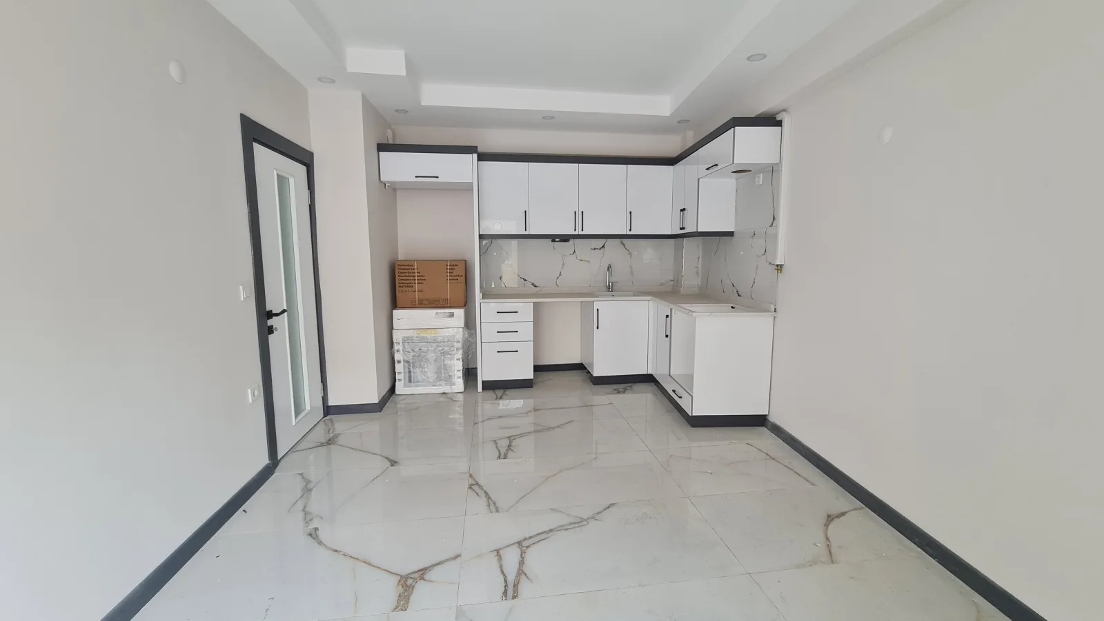 Burhaniye Kocacami Mahallesinde Satılık 1+1 Modern Daire