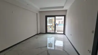 Burhaniye Kocacami Mahallesinde Satılık 1+1 Modern Daire
