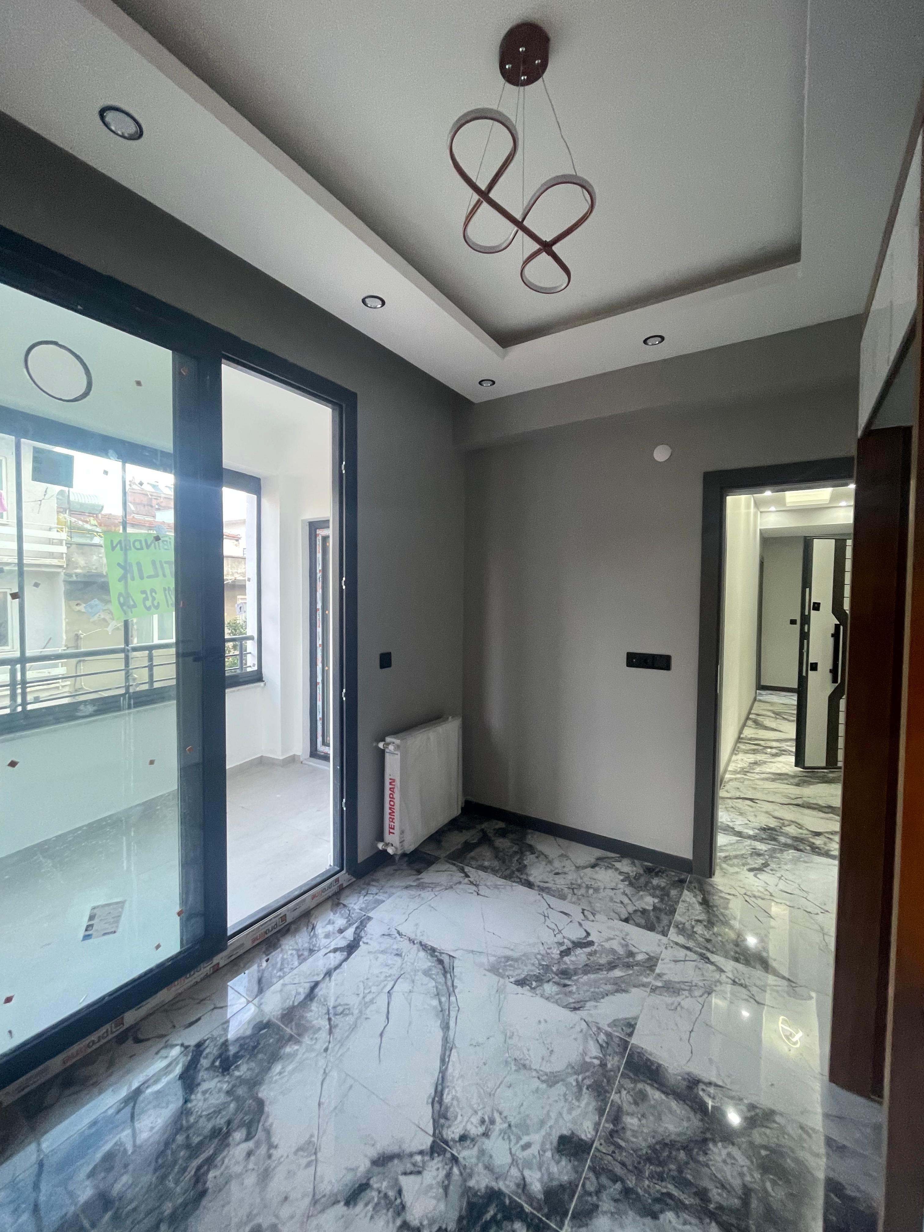 TUZCUMURAT MAHALLESİNDE SATILIK 2+1 DOĞALGAZLI ARAKAT DAİRE